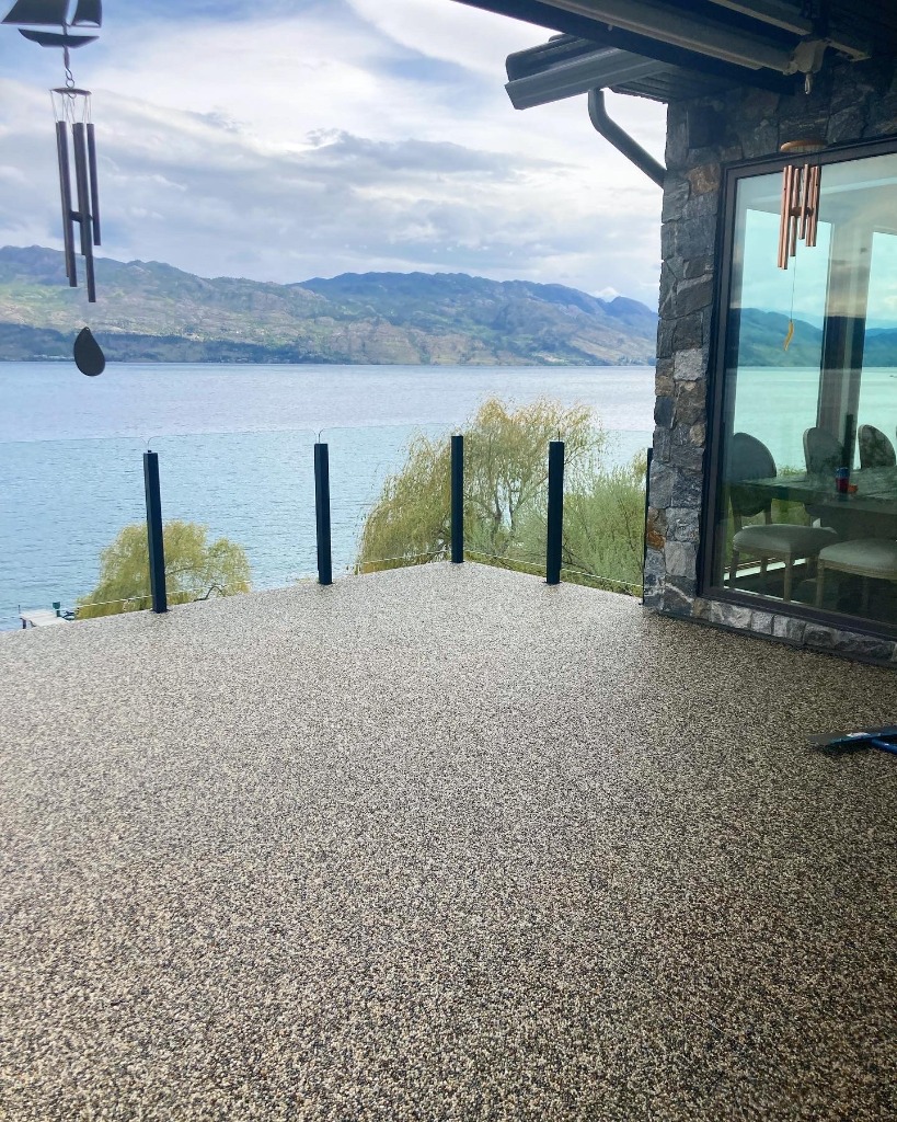 A lakefront patio with stone aggregate surfacing, shown on Sierra Stone’s website — A lakefront patio with stone aggregate surfacing, shown on Sierra Stone’s website. Photo: Sierra Stone South & Central Okanagan Ltd.